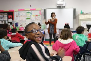 Smiling kid with Amanda flute 848